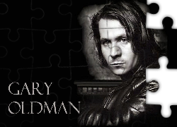 Gary Oldman,długie włosy, skóra