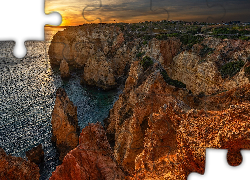 Portugalia, Region Algarve, Cypel, Ponta da Piedade, Morze, Skały, Zachód słońca