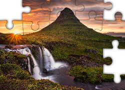 Islandia, Góra Kirkjufell, Wodospad Kirkjufellsfoss, Promienie słońca